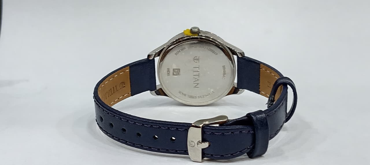 Titan Yin & Yang White Dial Analog Leather Strap Watch for Women  2649SL03